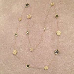 Long gold chain necklace with flower detail